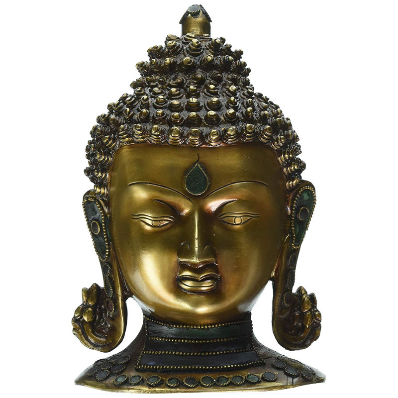 Tête de Bouddha avec pierres