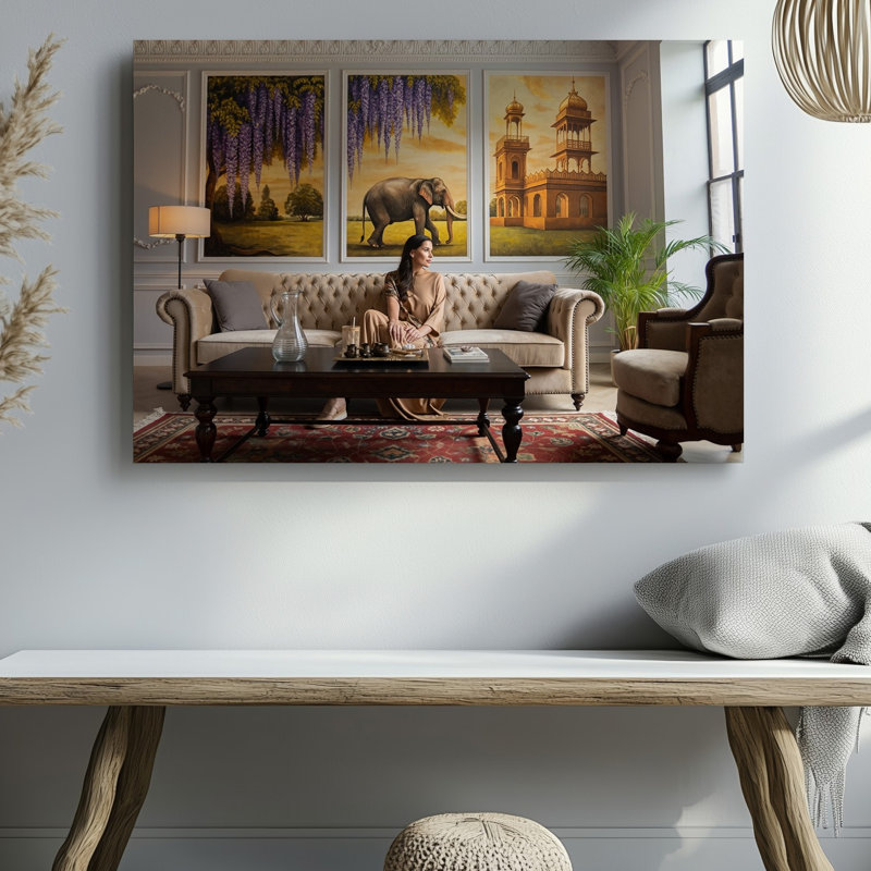 Toile, une scène de salon confortable avec une femme assise sur un art mural, un canapé beige moelleux élégamment orné d'un art mural sur toile contemplatif