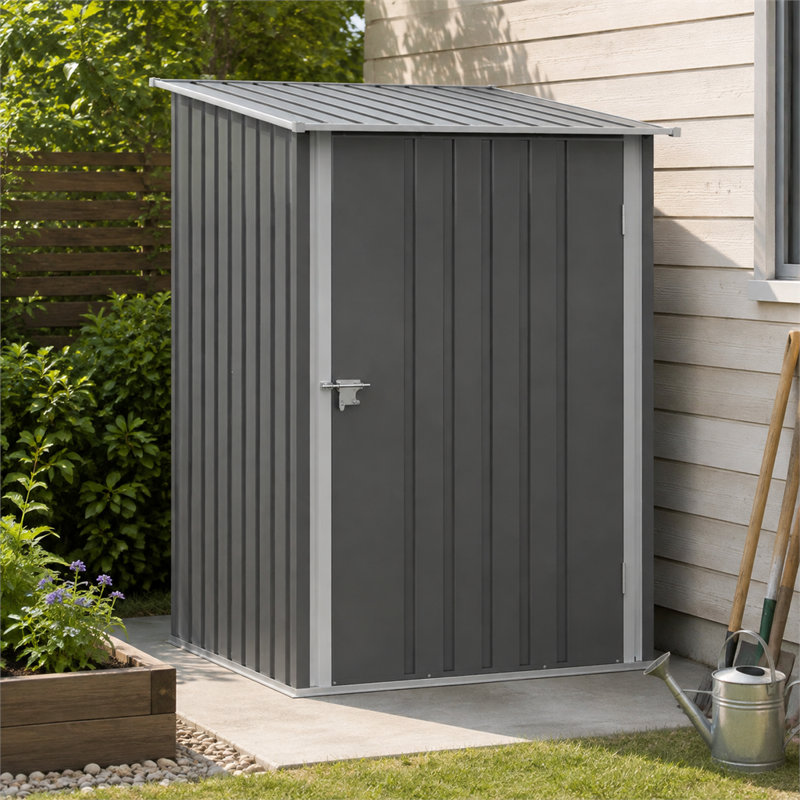 Abri de jardin gris adossé