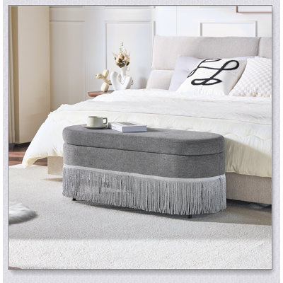 Repose-pieds ovale rembourré avec rangement à franges et couvercle relevable - Repose-pieds multifonctionnel et rangement caché pour le salon ou la chambre à coucher