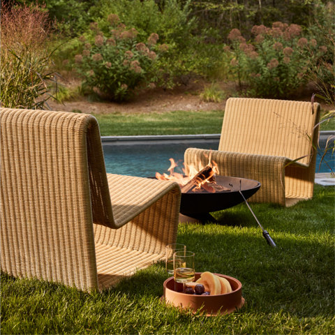 Outdoor lounge seating and fire pit.