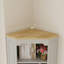 Armoire de rangement de coin autoportante avec 1 porte, 1 tiroir et une tablette réglable