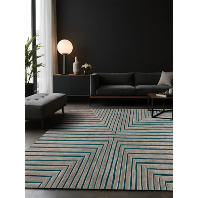 Tapis gris soyeux et moelleux