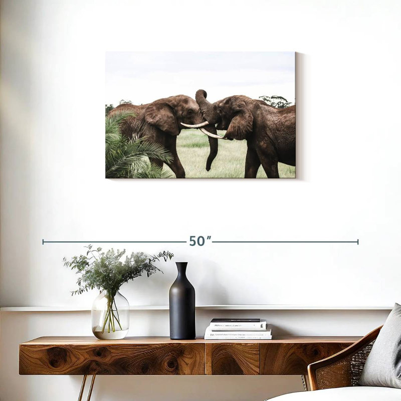 Brampt jouant des éléphants, H 20 po x l 30 po