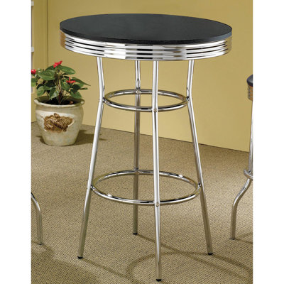 La table noire et de bar, idéale pour une table de salle à manger moderne, convient aux pièces contemporaines