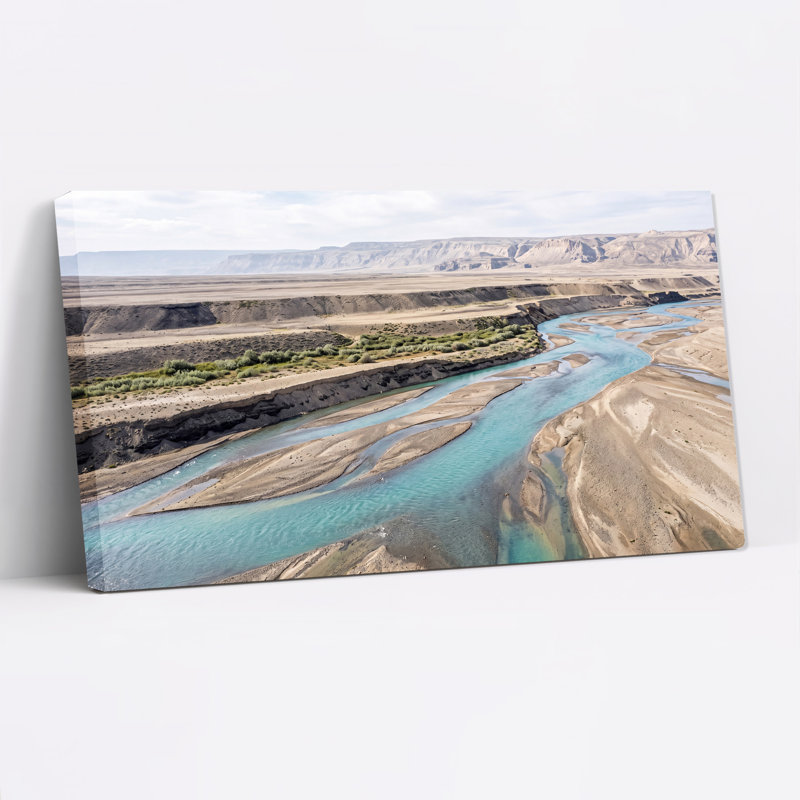 «Turquoise River Winding Through Arid Desert Valley», art mural, 46“W x 24”H