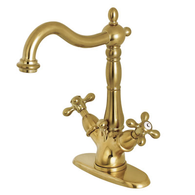 Kingston Brass Heritage Two-Handle 1-or-3 Hole Deck Mount Bathroom Faucet with Brass Pop-Up