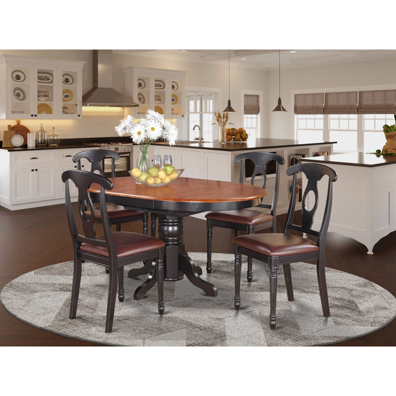 L'ensemble 5 pièces de table et chaises de cuisine comprend une table de salle à manger ovale avec rallonge papillon et 4 chaises rembourrées en similicuir de 42 po x 60 po, noir et cerise