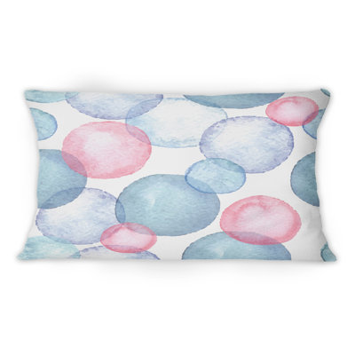 Coussin bleu et rose avec imprimé moderne