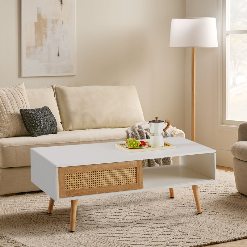 Table basse de 41,34 po de style rotin moderne avec pieds de rangement en bois massif et porte coulissante de couleur blanche