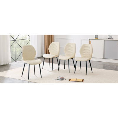 Ensemble de 4 chaises modernes en polyuréthane matelassé blanc de luxe avec pieds en métal noir. Convient comme chaises de salle à manger rembourrées avec dossiers pour les salles à manger, s'adaptant à un large éventail de situations.