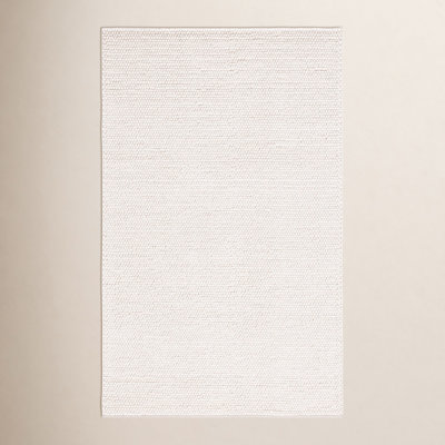 Tapis ivoire fait à la main de couleur unie Sitte