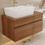 Petit meuble-lavabo flottant simple avec lavabo, conception peu encombrante pour les salles de bain modernes et minimalistes.