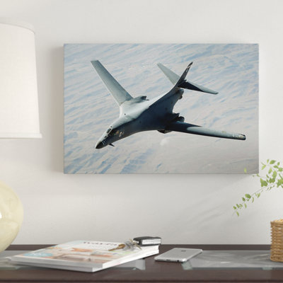 " A US Air Force B-1B Lancer On A Combat Patrol Over Afghanistan " by Stocktrek Images
