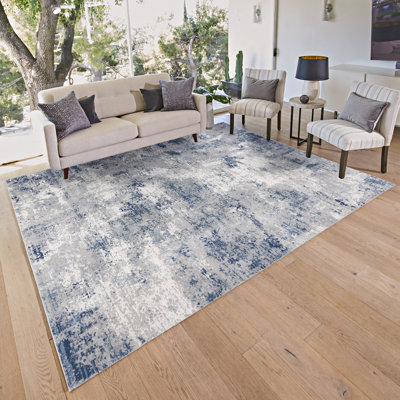 Tapis intérieur abstrait antidérapant en polyester bleu Gertmenian Eden Afina