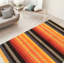Tapis noir / cuivre foncé en laine fait à la main Aeriss