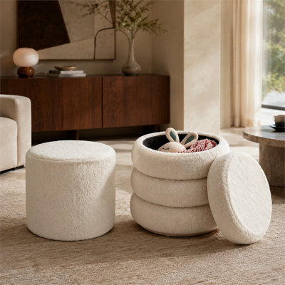 This white round storage footstool set (two pieces) features a removable cover and is suitable for use in various settings including the living room, bedroom, and modern dressing table.