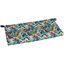 Bench seat cushion in a blue, red, pink, and green floral leaf pattern with black fabric corner ties
