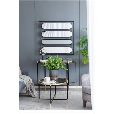 Large Four Oval Wall Mirror with Black Square Frame, Perfect for Adding Artistic Flair to Modern Living Rooms