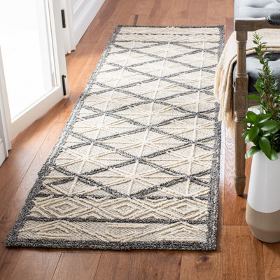 Colvin Hand Tufted Performance Geometric Rug