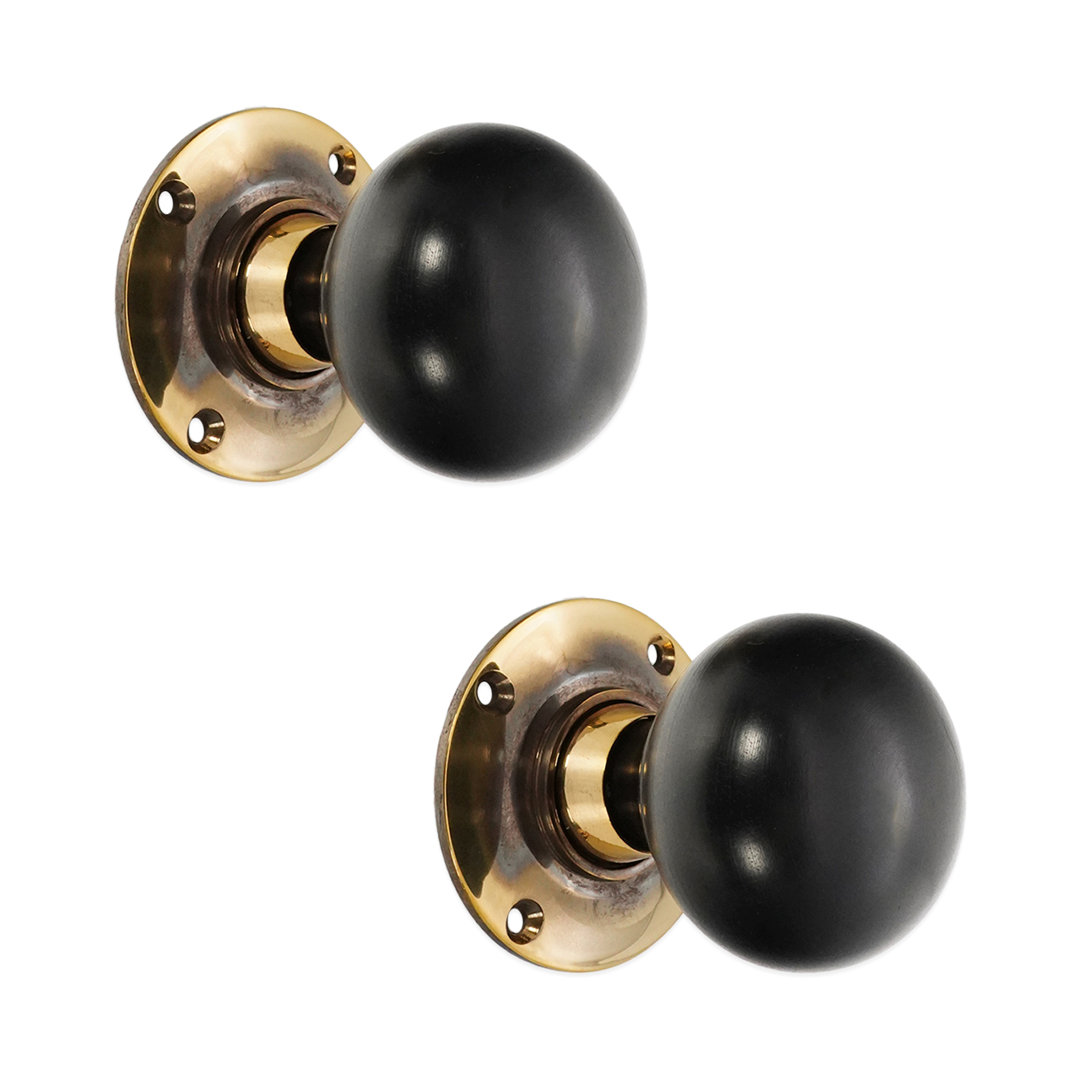 Ebony Bun Rim/Mortice Door Knob Aged Brass