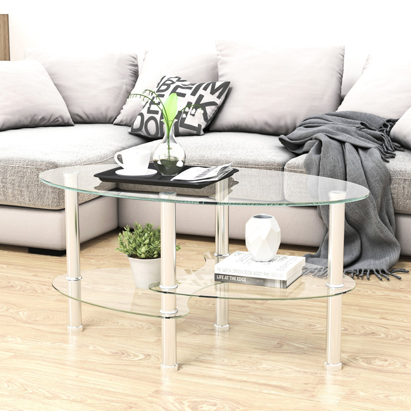 Table basse ovale moderne en verre transparent à 3 niveaux - Pieds en acier inoxydable, idéale pour la décoration du salon. Facile à nettoyer.