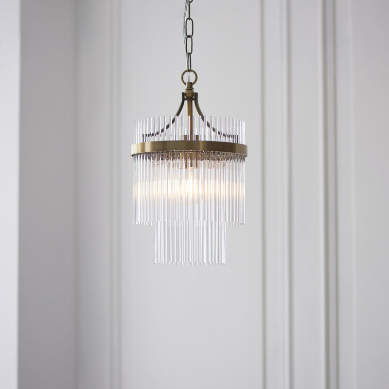 Geira Pendant light finished in Ant. Brass