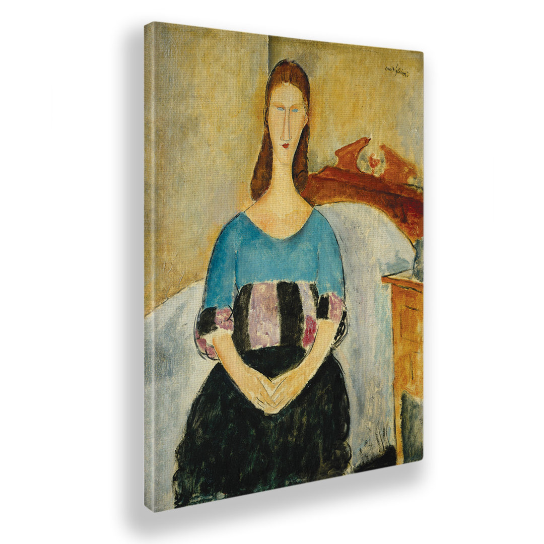 Wandbild Jeanne Hebuterne Auf dem Bett sitzend von Amedeo Modigliani