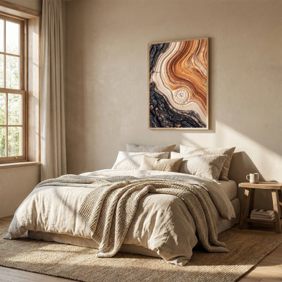 Art mural sur toile brun et noir avec anneaux d'arbre ondulé et écorce carbonisée