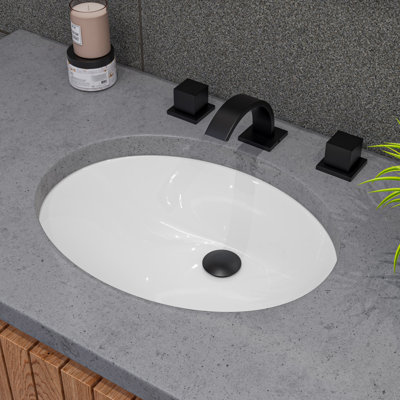 Lavabo de salle de bain ovale blanc encastré avec trop-plein