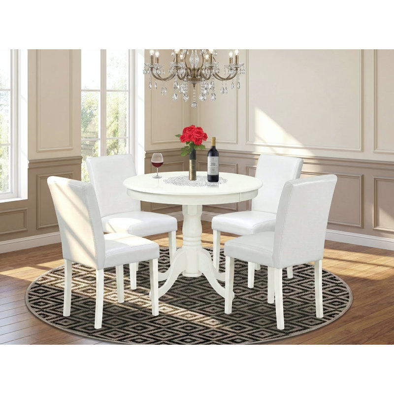 Ensemble de table de salle à manger 5 pièces comprenant une table de cuisine ronde avec piédestal et 4 chaises Parson revêtues de similicuir blanc, lin blanc