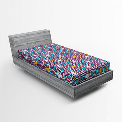 Drap-housse avec plaque d’orientation géométrique