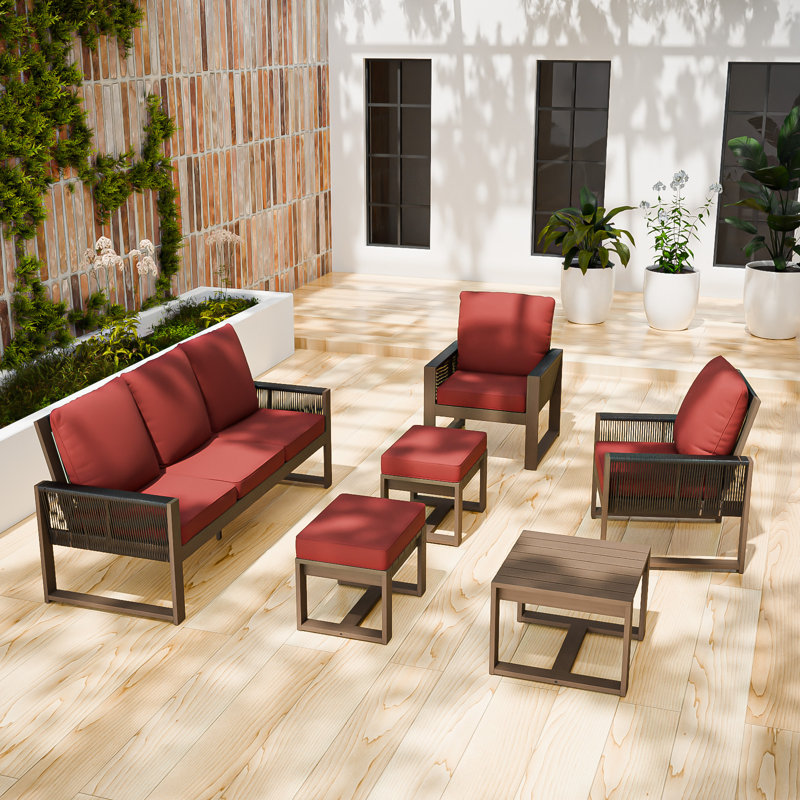 Ensemble de conversation 6 pièces avec canapé en bois de cèdre brun et osier gris avec coussins en oléfine, table basse carrée et repose-pieds