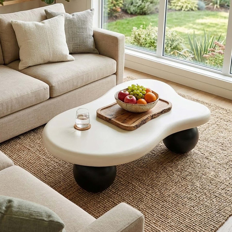 Modern 47" Cloud-Shaped Coffee Table with Three Ball Legs, Minimalist Low Accent Table for Living Room and Lounge Spaces