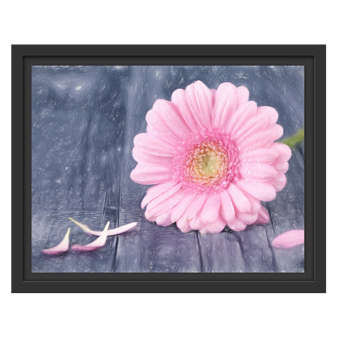 Gerahmtes Wandbild pinke Gerbera auf rustikalem Boden