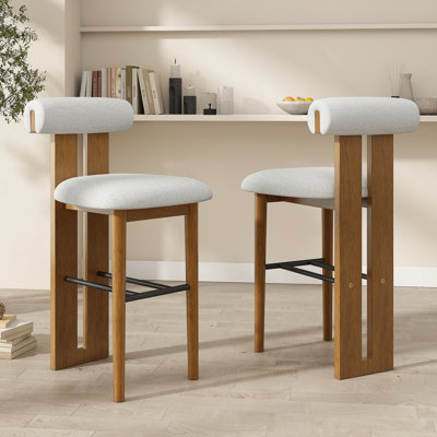 Ensemble de tabourets d'intérieur rembourrés fabriqués à partir de bois provenant de sources durables, idéal pour divers styles d'intérieur et sièges confortables