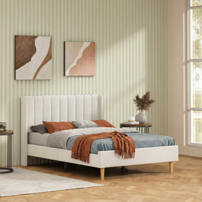 Upholstered Metal Wingback Bed