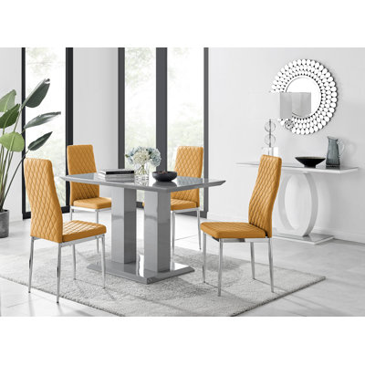 Eubanks Double Pedestal High Gloss Dining Table Set with 4 Luxury Faux Leather Dining Chairs