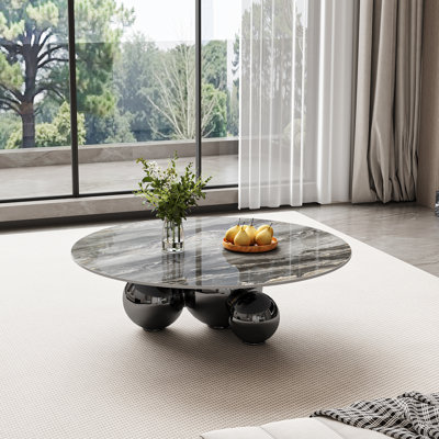 Table basse 39,5, table basse moderne avec plateau en pierre frittée Pandora
Trois boules noires