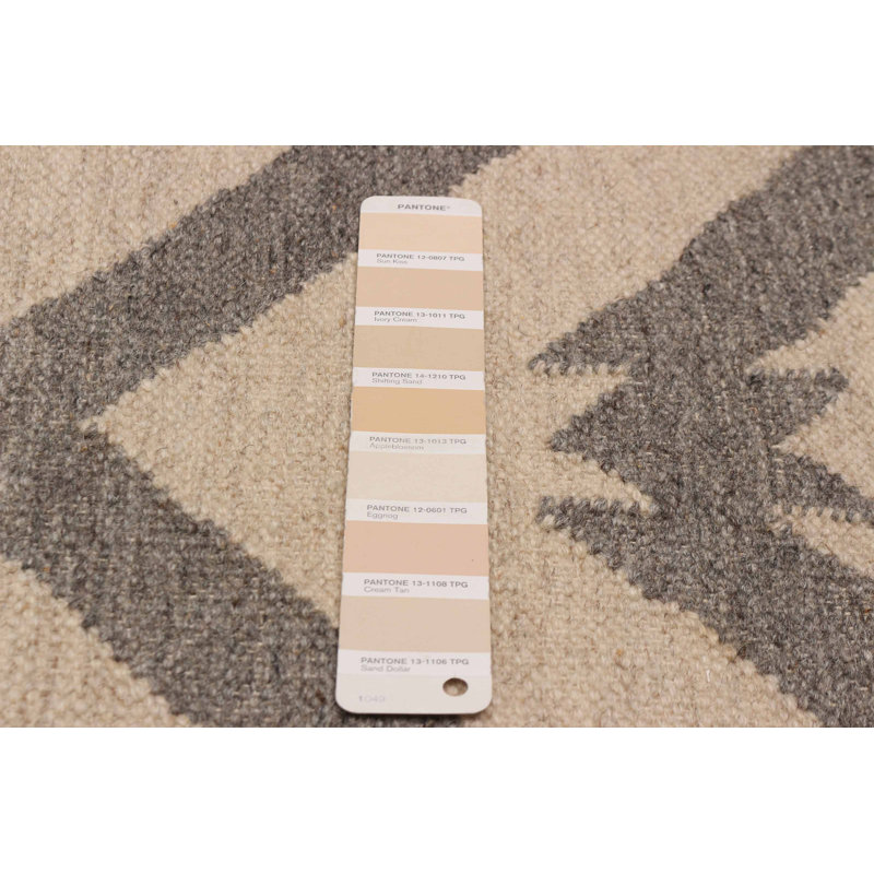 Tapis unique en laine nouvel âge rectangulaire 5 pi 0 po x 7 pi 8 po ivoire