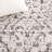 Caniah Hand Tufted Wool/Viscose/Cotton Floral Rug in Black/Ivory-1575028140