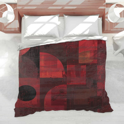Édredon rouge à formes géométriques abstraites