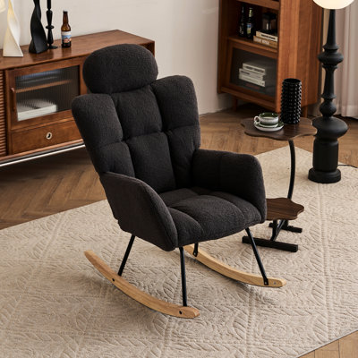 Fauteuil oscillant berçant gris foncé avec rembourrage en mousse et coussins