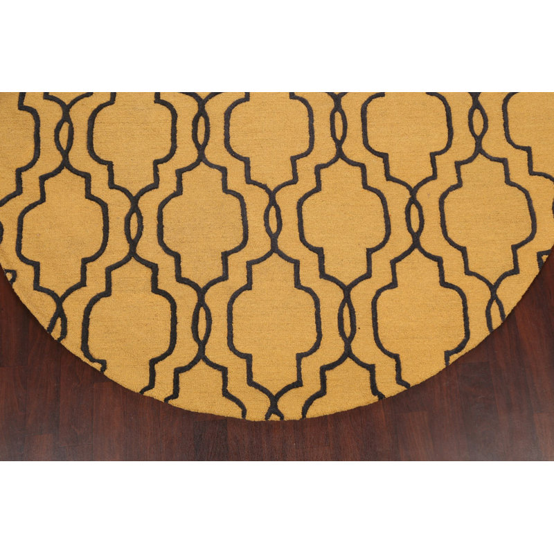 Tapis rond en laine touffeté à la main à motif géométrique doré