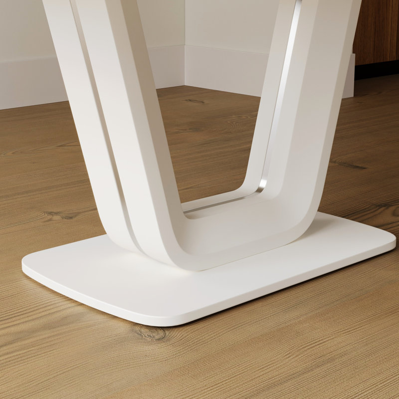 Table de salle à manger blanche moderne avec pieds en forme de U, pieds faciles à nettoyer pour un style sophistiqué