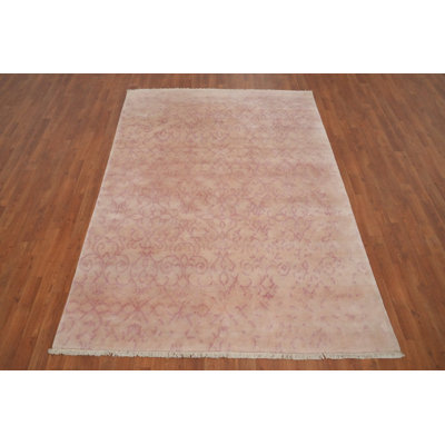 Tapis oriental népalais élégant de couleurs pastel 6 x 8