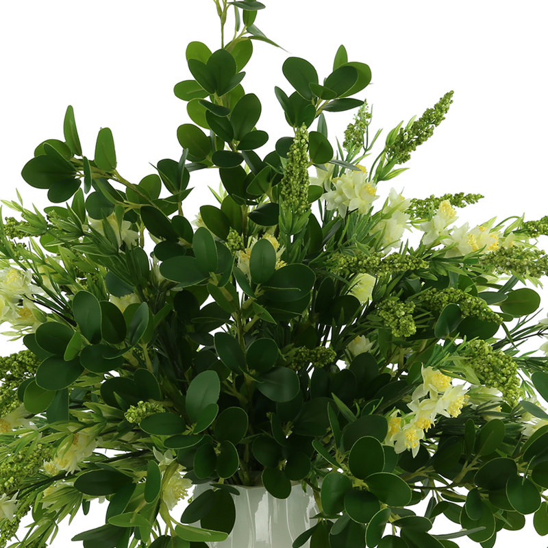 Budding Hydrangeas and Boxwoods Arranged in a Ceramic Vase