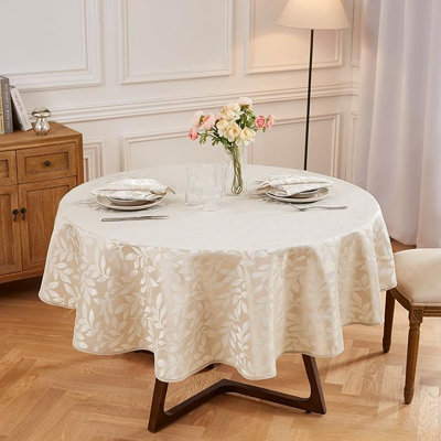 Nappe ronde en velours avec serviettes décoratives assorties incluses.