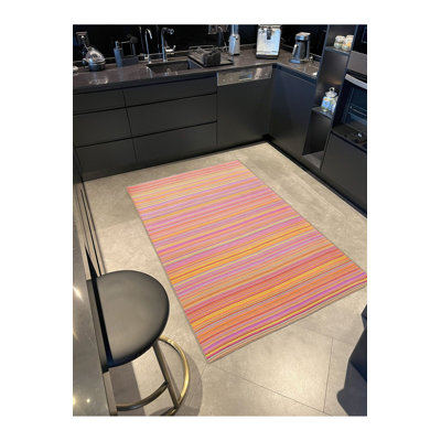 Tapis tissé rose à motif lavable