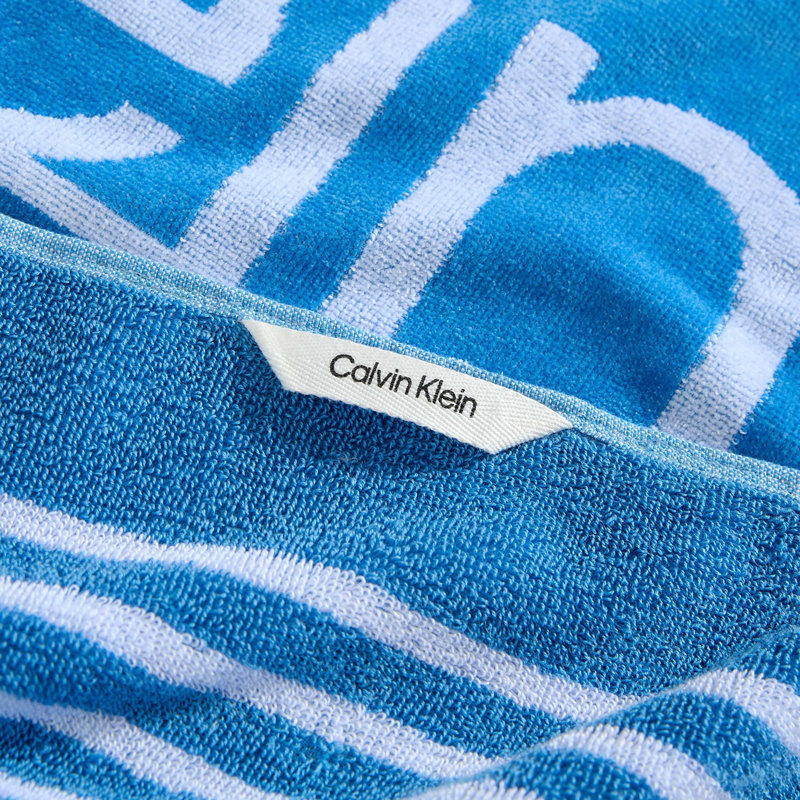 Ensemble de serviettes de plage bleues Calvin Klein, Logo à fines rayures bleu